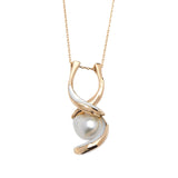 SHARK PENDANT IN YELLOW GOLD WITH PEARL AND MOTHER OF PEARL INLAY