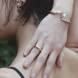 SHARK CUFF IN YELLOW GOLD WITH BAROQUE SOUTH SEA PEARL